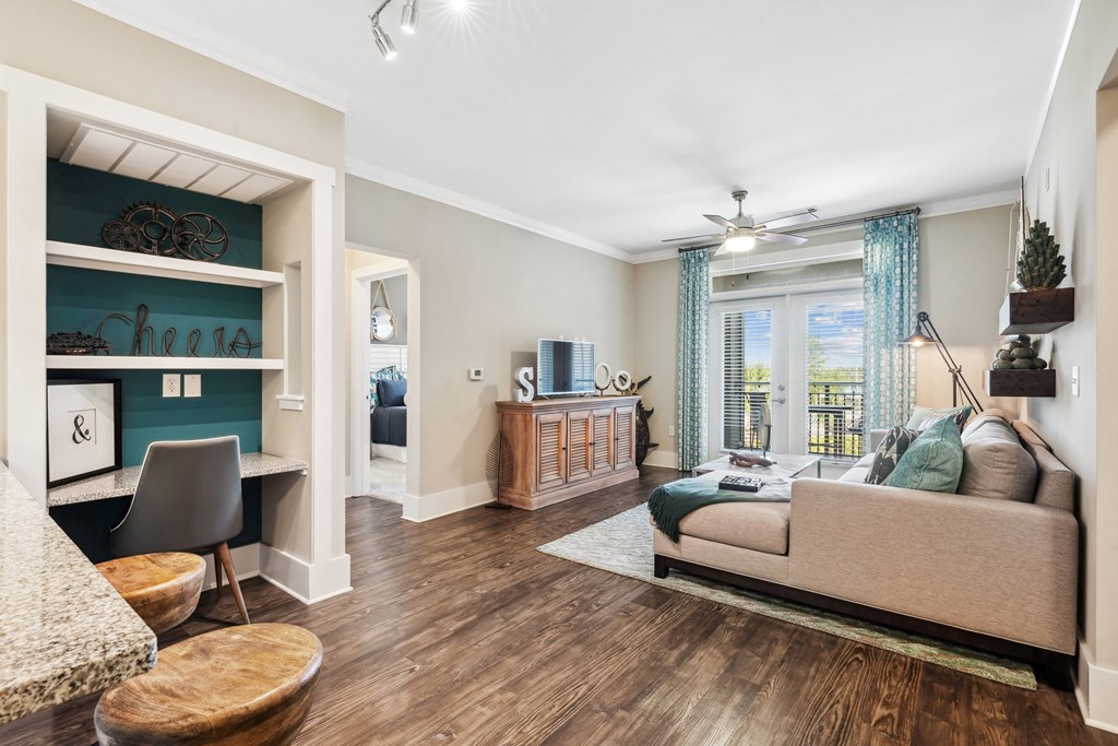 a living room with a couch and a tv
