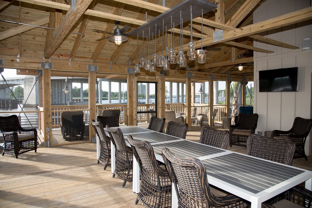 a large dining area with a table and chairs