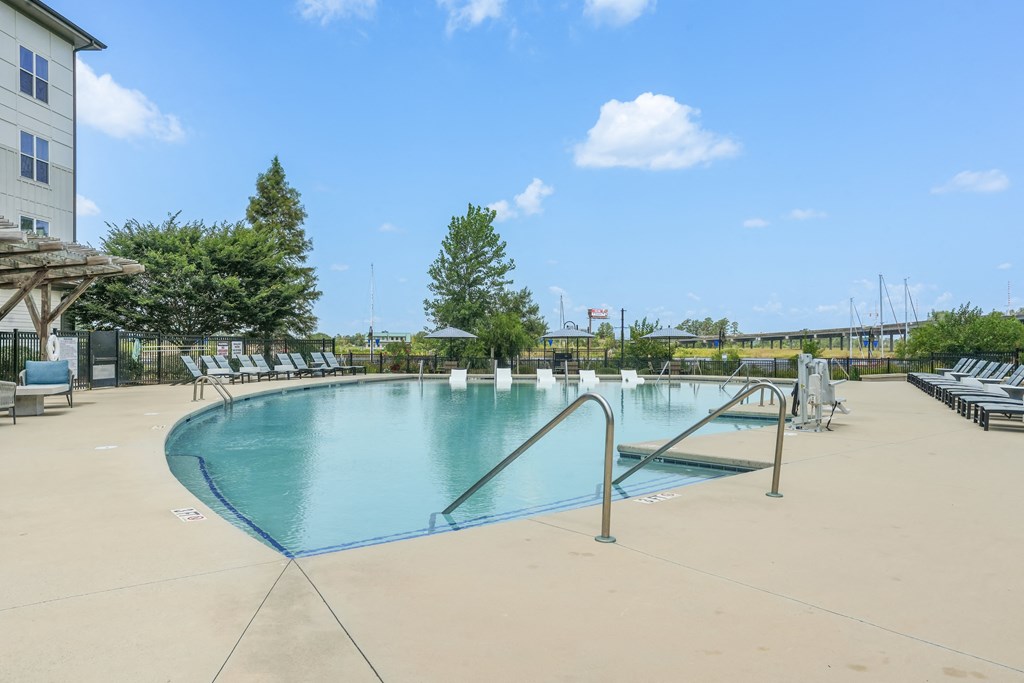 our resort style swimming pool is next to our hotel building and has chairs around it
