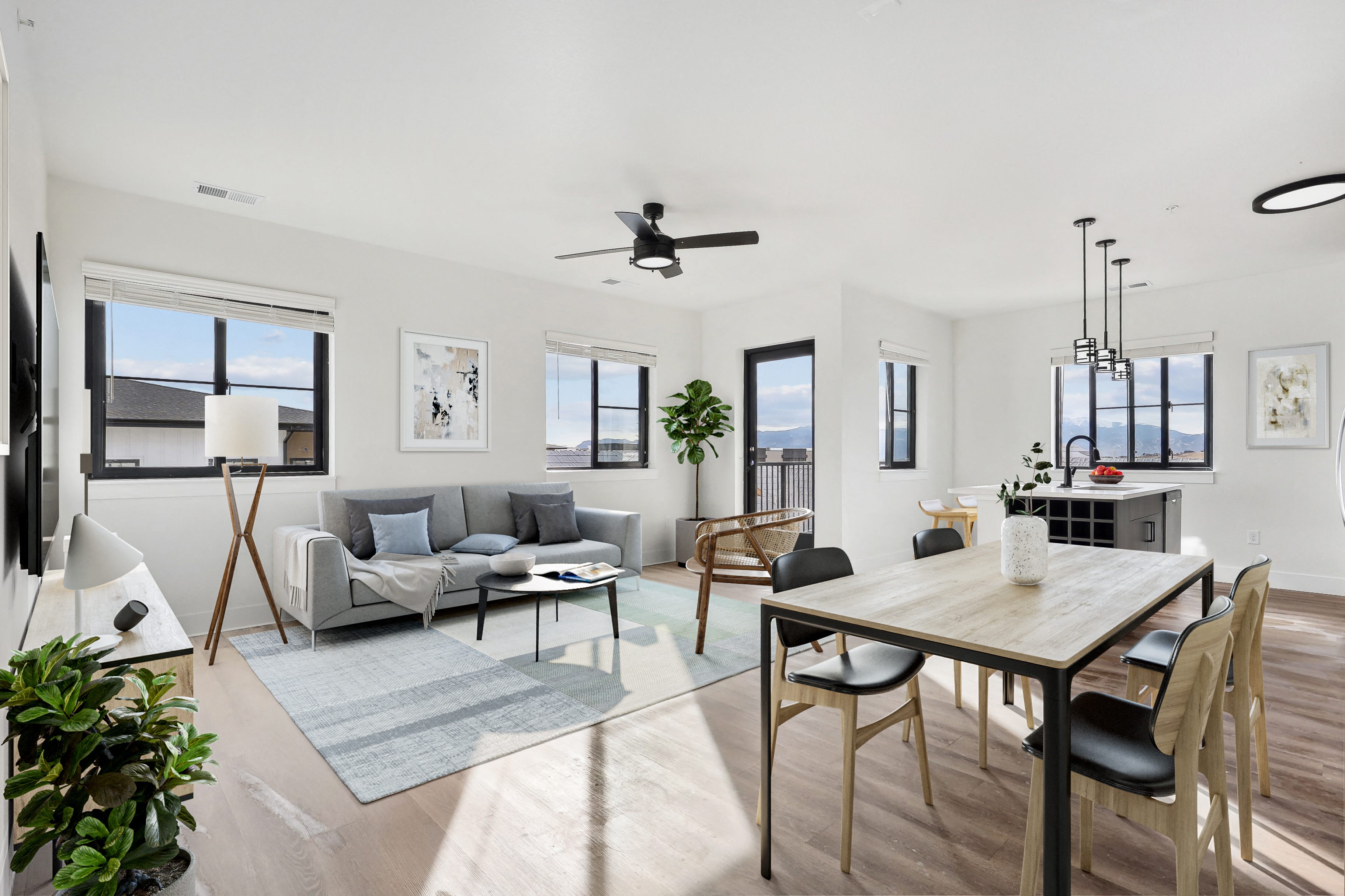 a living room with a couch and a dining room table