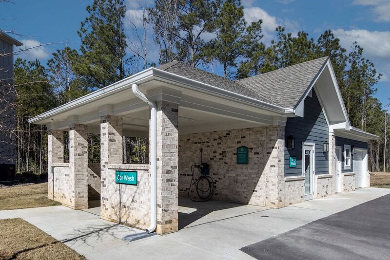 a small building with a bike parked outside of it