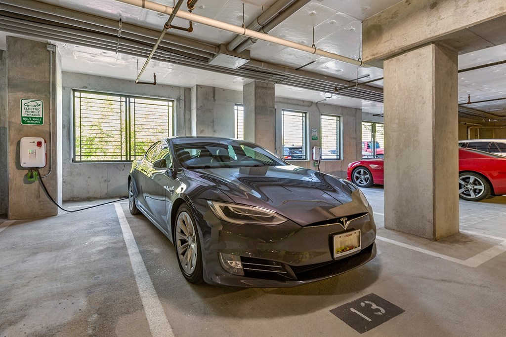 an electric car parked in a parking garage