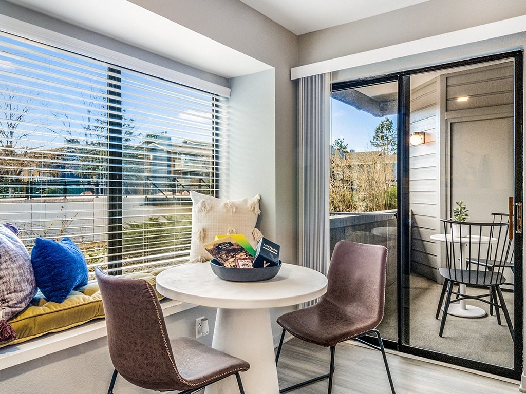 a living room with a table with a bowl of food on it