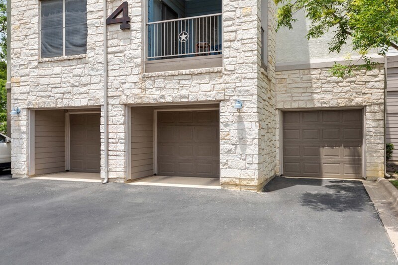 a house with three garage doors