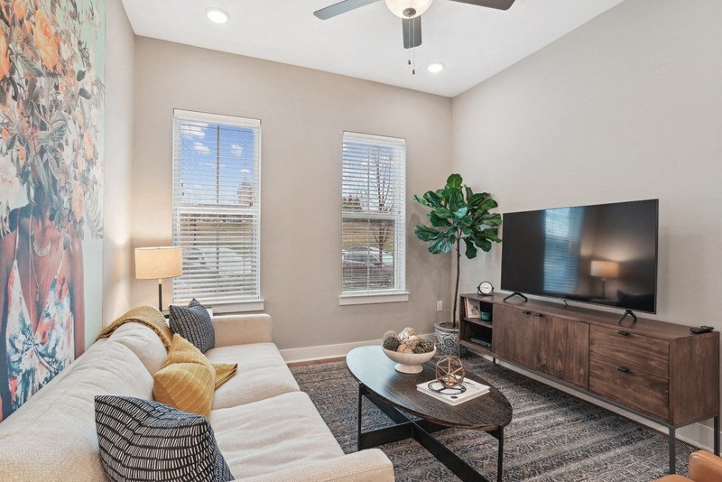 a living room with a couch and a tv