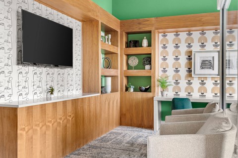 a clubhouse with a couch and a television