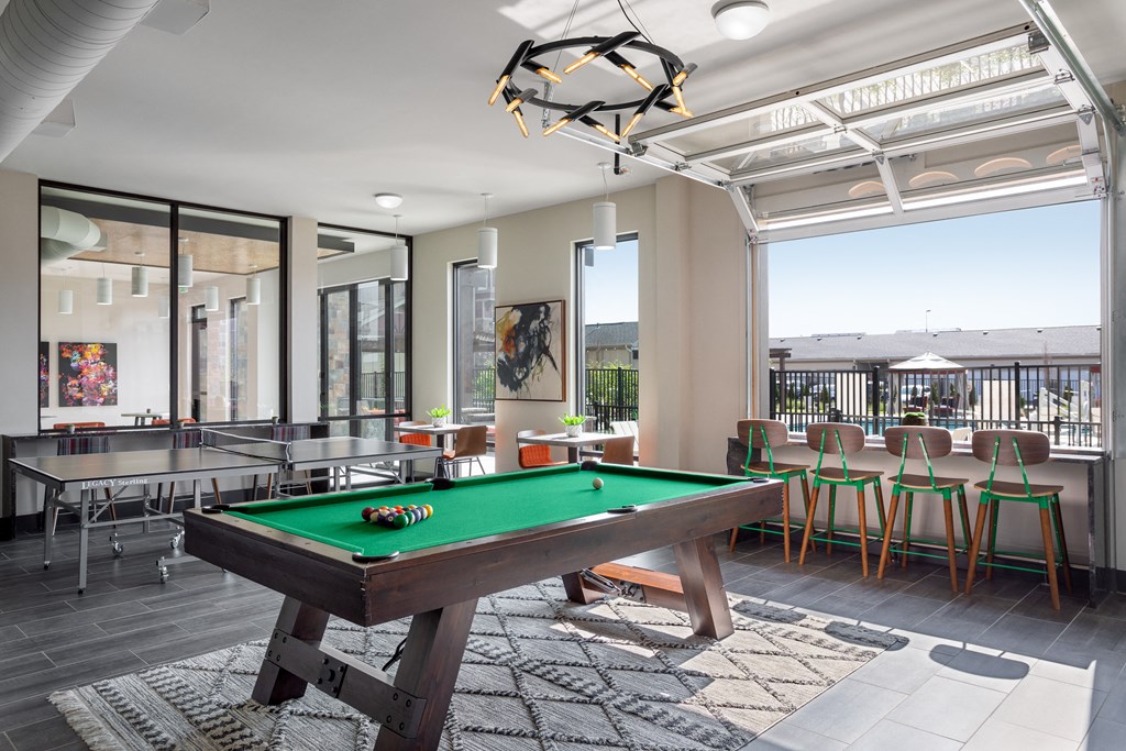 play a game of pool in our clubhouse at our apartments
