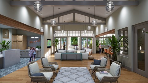 A modern lobby with a large area rug and several chairs.