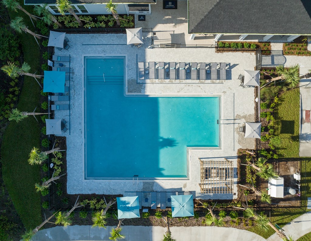 a house with a swimming pool in the backyard