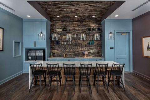 Clubhouse kitchen with lining chairs and a table