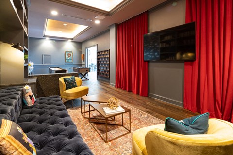 A game room with fooseball and shuffleboard