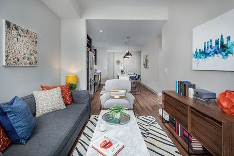 Living room with a couch facing a television stand