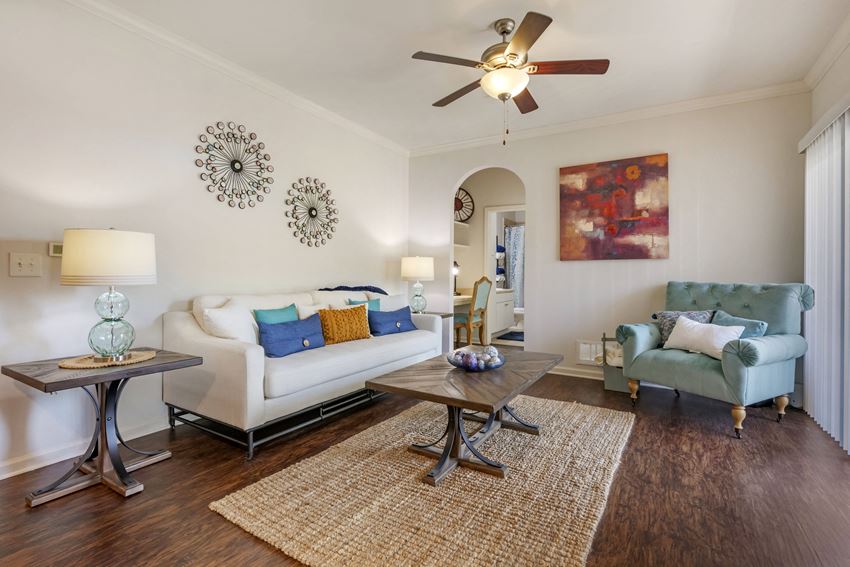 interior model living room with a ceiling fan and hardwood floors
