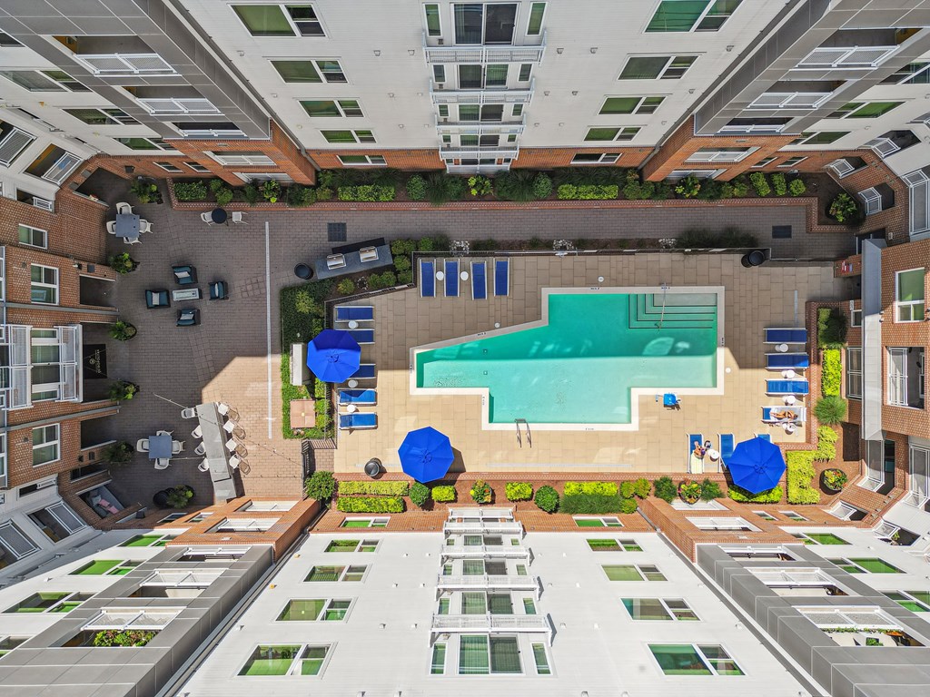 an overhead view of a swimming pool in the middle of a building