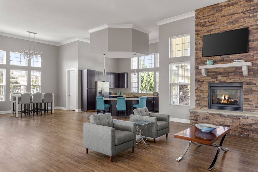 the preserve at ballantyne commons living room with fireplace and dining area