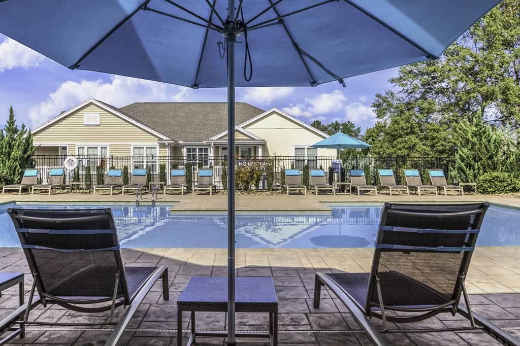 exterior community pool with seating