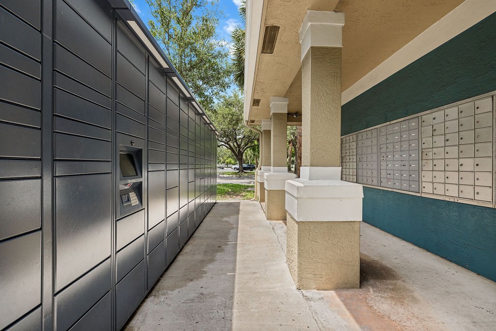 Black package lockers outdoors.