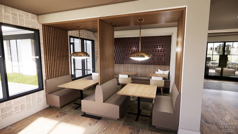 A modern dining area with wooden floors and furniture.