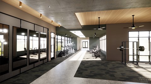 A gym with a variety of equipment and a long mirrored wall.