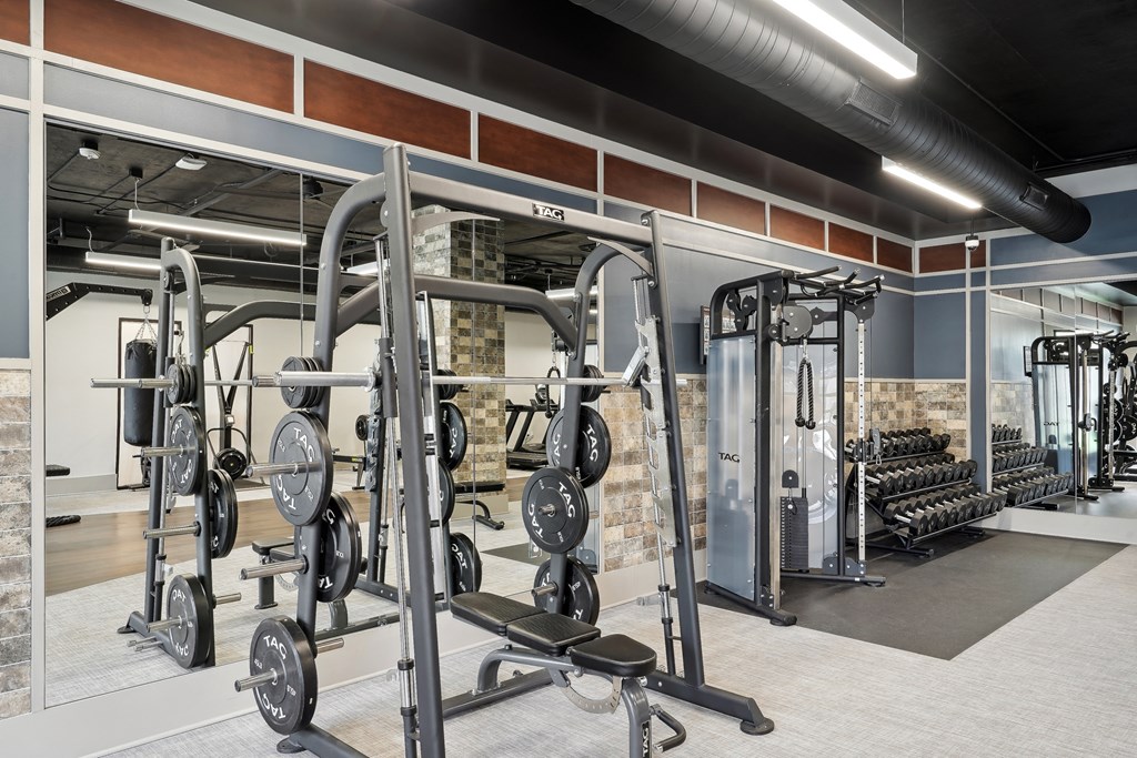 a gym with weights and other exercise equipment