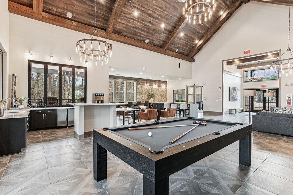 play a game of pool in our clubhouse at our apartments