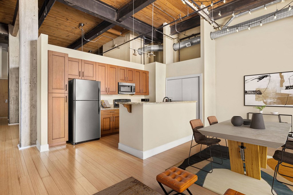 an open floor plan with a kitchen and dining area