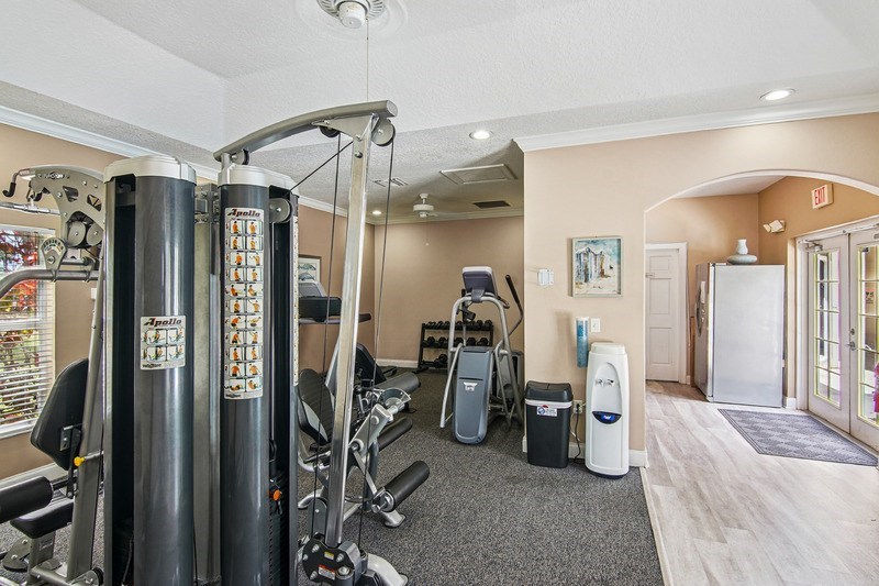 A gym with a variety of equipment.