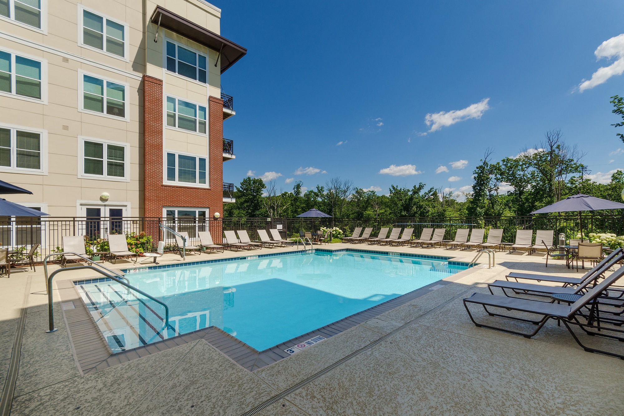 our apartments have a resort style pool with lounge chairs