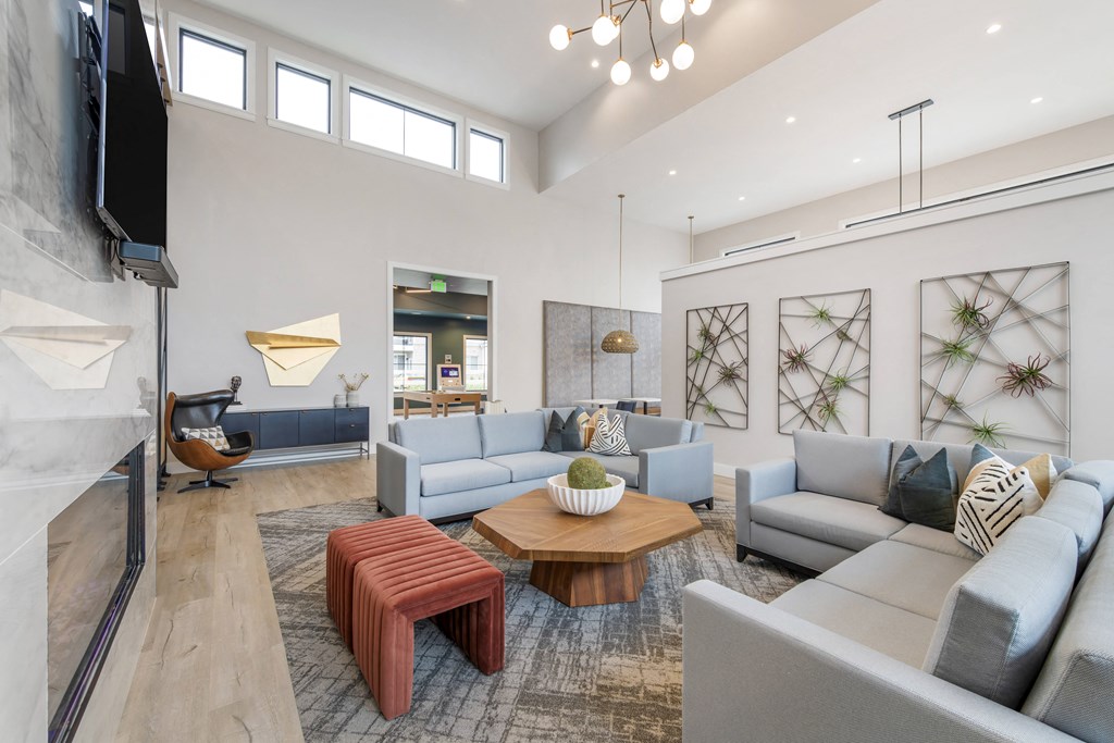 a living room with couches and a coffee table