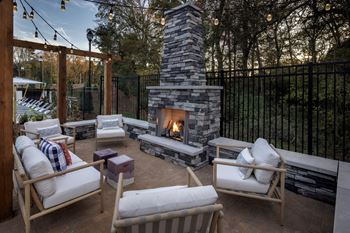 Outdoor firepit and comfortable lawn furniture.