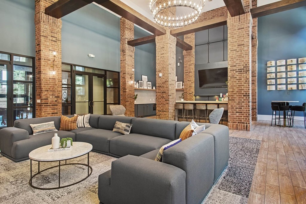 a living room with a couch and a table