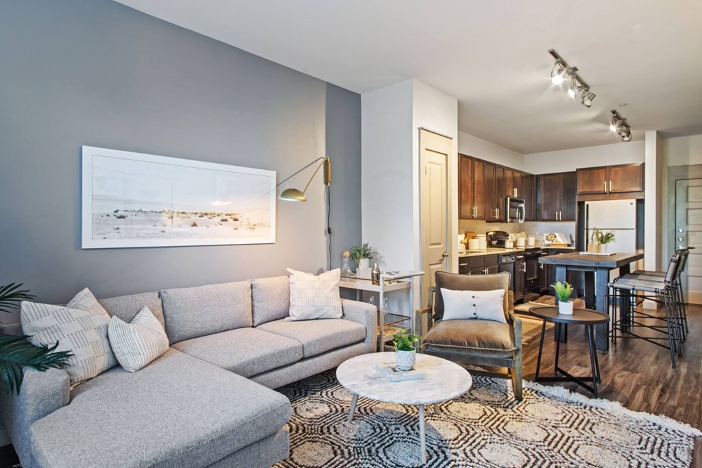 a living room with a couch and a table