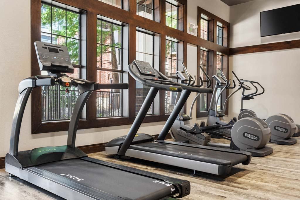 the gym is equipped with a variety of exercise equipment