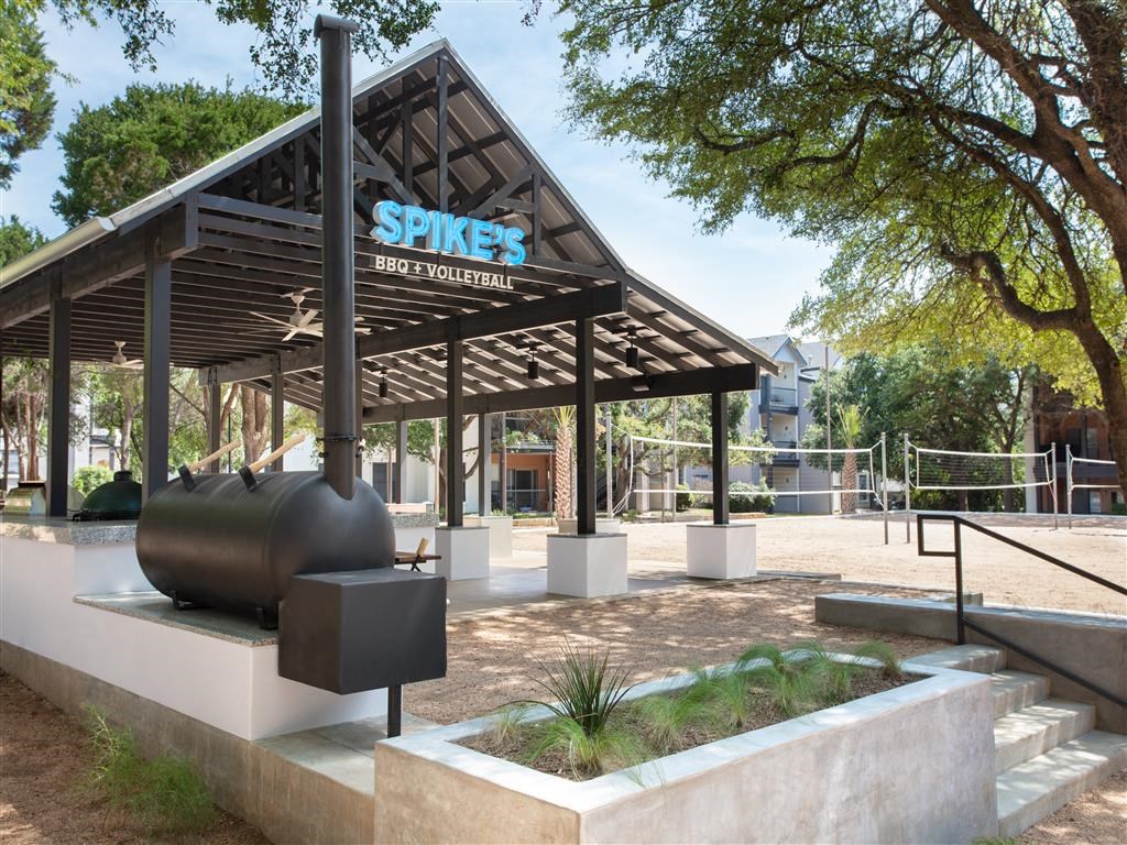 a pavilion with a gas cylinder in front of a playground