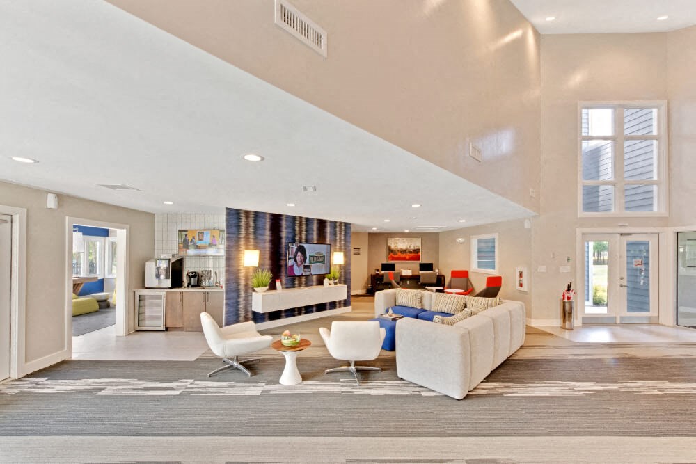 a living room with a couch and a table