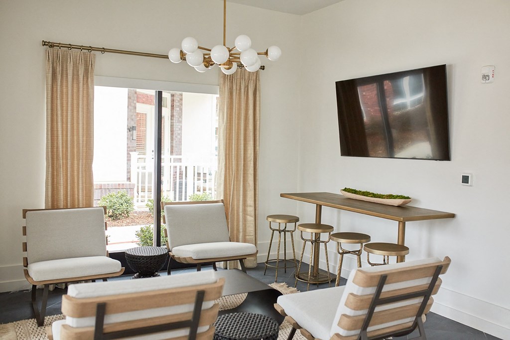 pool aqua lounge with seating and tv