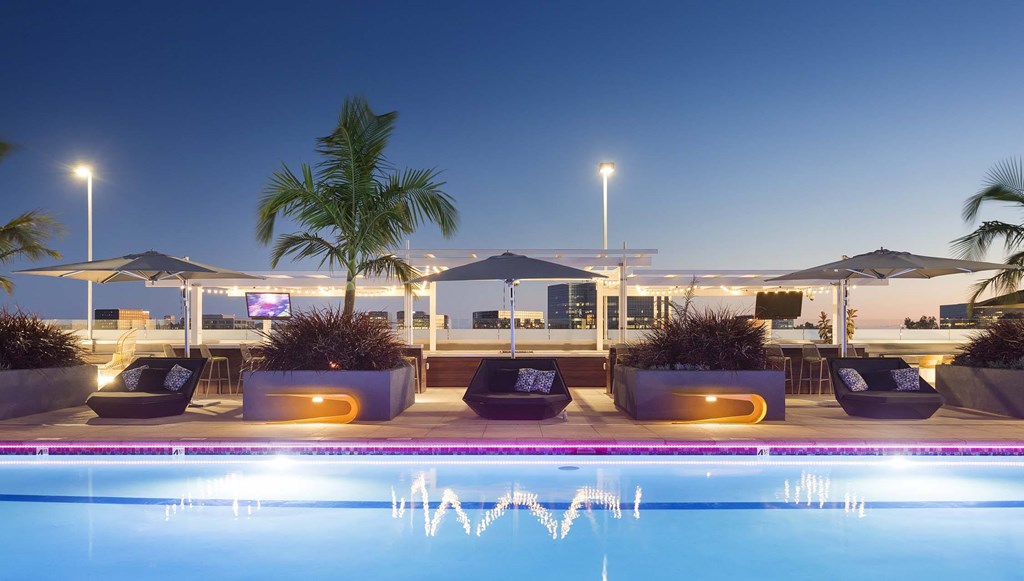 A pool with a lighted line in the middle of it.