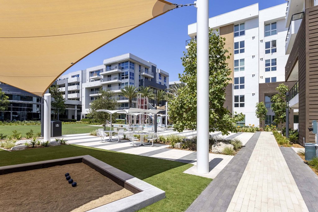 A modern outdoor area with a pool and a walkway.