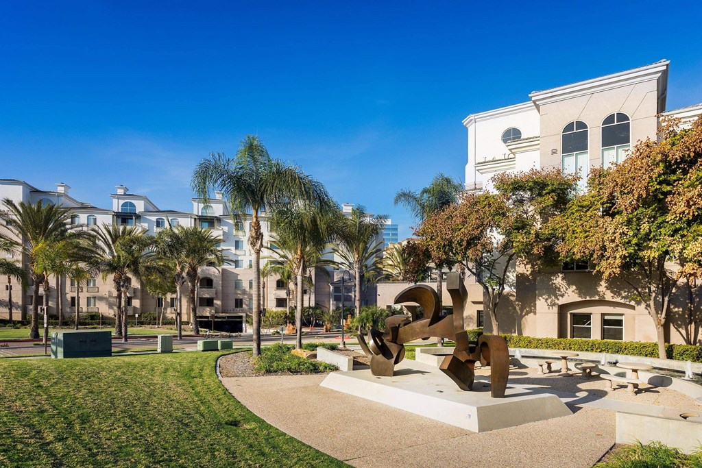 A sculpture in a park with a building in the background. at La Jolla Crossroads Apartments, San Diego, California
