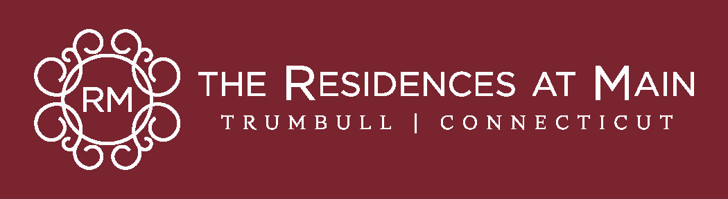 The image is a logo for "The Residences at Main" in Trumbull, Connecticut.