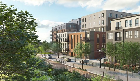 A row of modern apartment buildings are shown in the image.