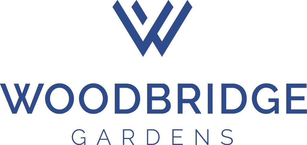 A logo with the text "Woodbridge Gardens" in blue.