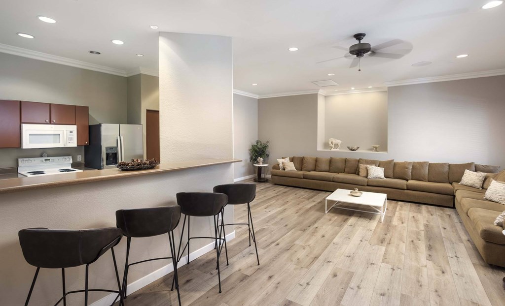 A modern living room with a kitchen area at Vintage at Scottsdale, Arizona