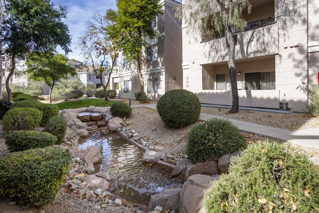 A small stream runs through a landscaped garden.at Vintage at Scottsdale, Arizona, 85260