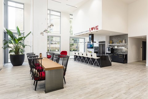 Modern community kitchen with dining area at LUX by Garden* Apartments, San Diego