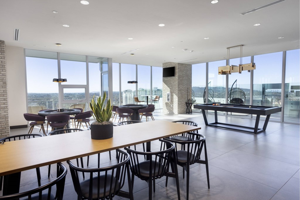 A conference room with a long table and chairs. at LUX by Garden*, San Diego, California