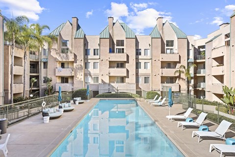 Pool With Lounge Chairs at Costa Verde Village Apartments, San Diego, CA 92122