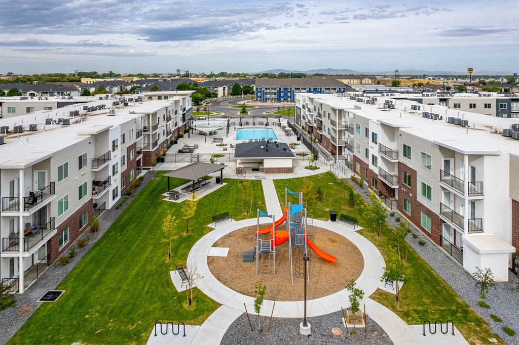 an aerial view of an apartment complex with a playground