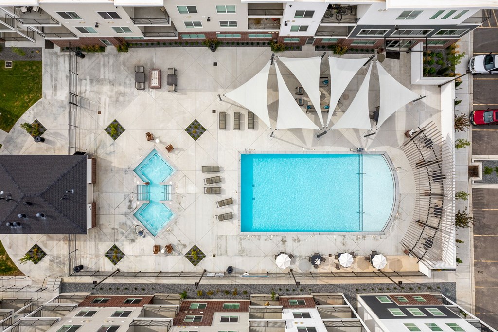 arial view of a swimming pool in the middle of a building