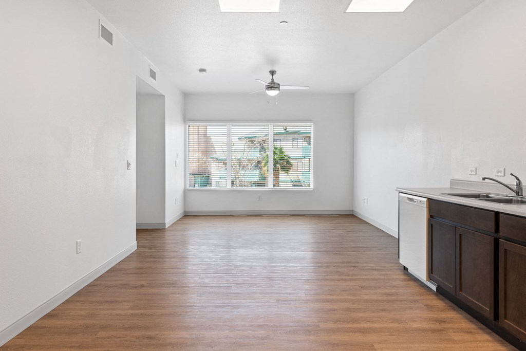 a kitchen and living room in a 555 waverly unit